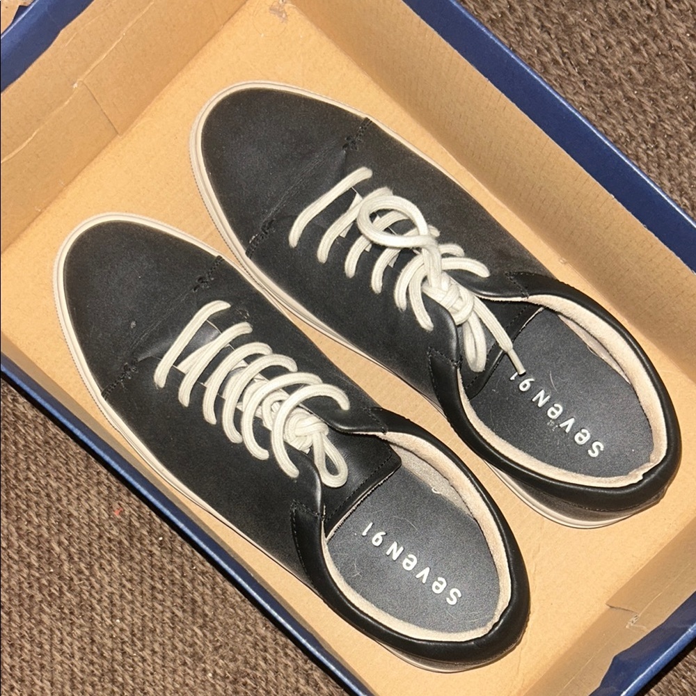 Black Low-Top Sneakers with White Laces